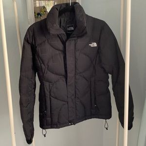 The North Face 600 snowboard jacket black with multiple pockets, size medium